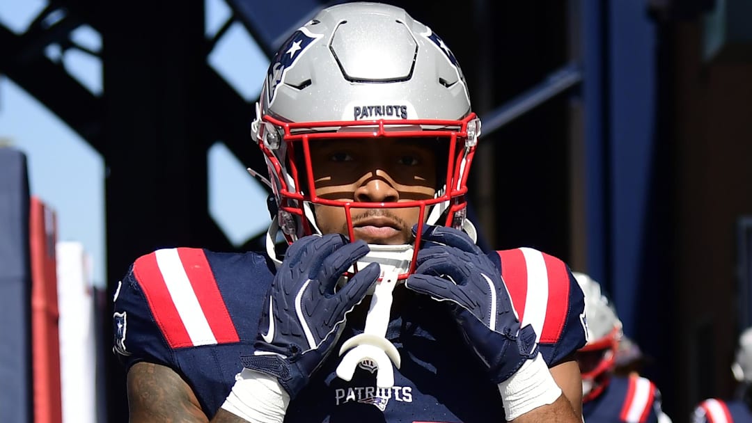 Sep 28, 2025; Foxborough, Massachusetts, USA; New England Patriots running back Treveyon Henderson (32) walks out onto the field for warmups prior to a game against the Carolina Panthers at Gillette Stadium. Sep 28, 2025; Foxborough, Massachusetts, USA; New England Patriots running back Treveyon Henderson (32) walks out onto the field for warmups prior to a game against the Carolina Panthers at Gillette Stadium.