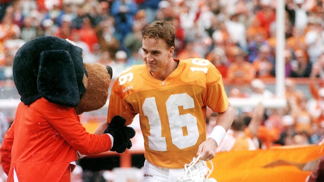 Rather than go to the NFL, where he may have been the No. 1 pick in 1996, Peyton Manning returned for his senior year in ‘97.