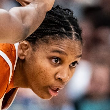 Texas Longhorns forward Madison Booker (35) looks for a way around defense from South Carolina Gamecocks guard Bree Hall (23) the first half of the Longhorns' NCAA Playoff semi-final game against the South Carolina Gamecocks at Amalie Arena in Tampa, Florida, April 4, 2025.