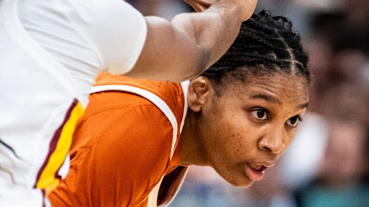 Texas Longhorns forward Madison Booker (35) looks for a way around defense from South Carolina Gamecocks guard Bree Hall (23) the first half of the Longhorns' NCAA Playoff semi-final game against the South Carolina Gamecocks at Amalie Arena in Tampa, Florida, April 4, 2025.