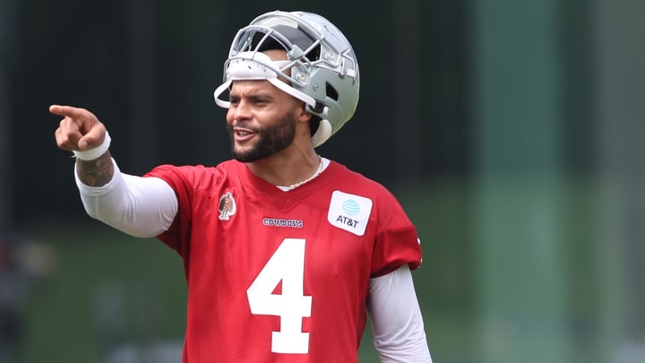 Jun 4, 2024; Frisco, TX, USA;  Dallas Cowboys quarterback Dak Prescott (4) goes through a drill during practice at the Ford Center at the Star Training Facility in Frisco, Texas. Mandatory Credit: Tim Heitman-USA TODAY Sports