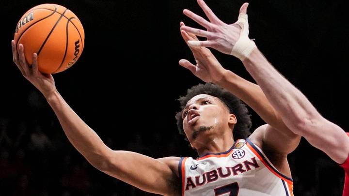 Auburn Tigers guard Keyshawn Hall (7) goes up for a basket against Illinois State Redbirds forward Brandon Lieb (12) on Thursday, April 2, 2026, during an NIT semifinals matchup at Hinkle Fieldhouse in Indianapolis. Auburn Tigers guard Keyshawn Hall (7) goes up for a basket against Illinois State Redbirds forward Brandon Lieb (12) on Thursday, April 2, 2026, during an NIT semifinals matchup at Hinkle Fieldhouse in Indianapolis.