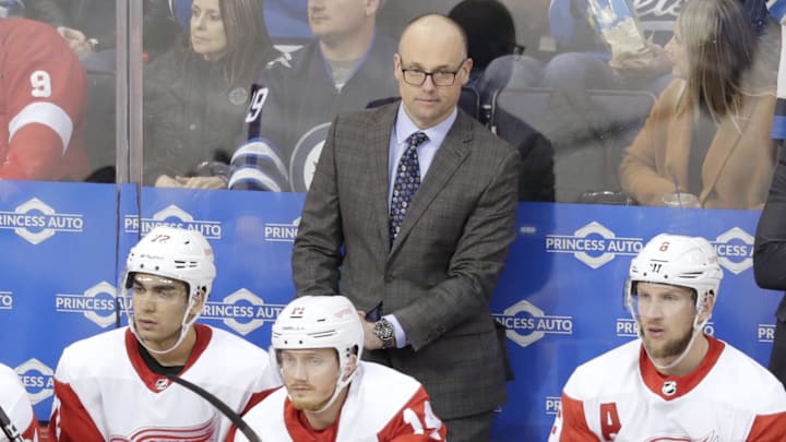 Detroit Red Wings Head Coach Jeff Blashill looks on in the third period against the Winnipeg Jets at Bell MTS Place. Detroit Red Wings Head Coach Jeff Blashill looks on in the third period against the Winnipeg Jets at Bell MTS Place.
