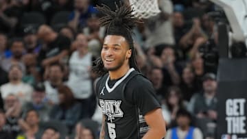 Mar 2, 2025; San Antonio, Texas, USA;  San Antonio Spurs guard Stephon Castle (5) reacts after a shot in the first half against the Oklahoma City Thunder at Frost Bank Center. Mandatory Credit: Daniel Dunn-Imagn Images