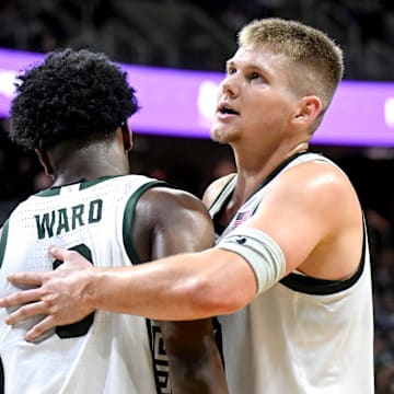 Michigan State's Jaxon Kohler, right, celebrates with Cam Ward after Ward drew a Colgate foul during the second half on Monday, Nov. 3, 2025, at the Breslin Center in East Lansing.