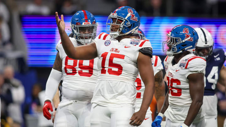 Dec 30, 2023; Atlanta, GA, USA; Mississippi Rebels defensive end Jared Ivey (15) celebrates after a tackle against the Penn State Nittany Lions in the first quarter at Mercedes-Benz Stadium. Mandatory Credit: Brett Davis-USA TODAY Sports
