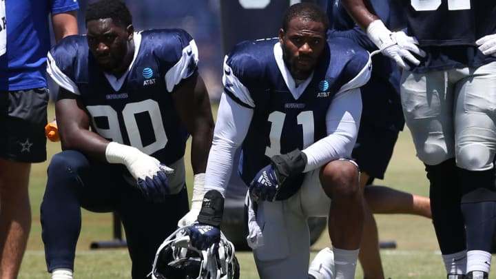 Jul 30, 2024; Oxnard, CA, USA; Dallas Cowboys defensive end DeMarcus Lawrence (90) and linebacker Micah Parsons (11) during training camp at the River Ridge Playing Fields in Oxnard, California. 