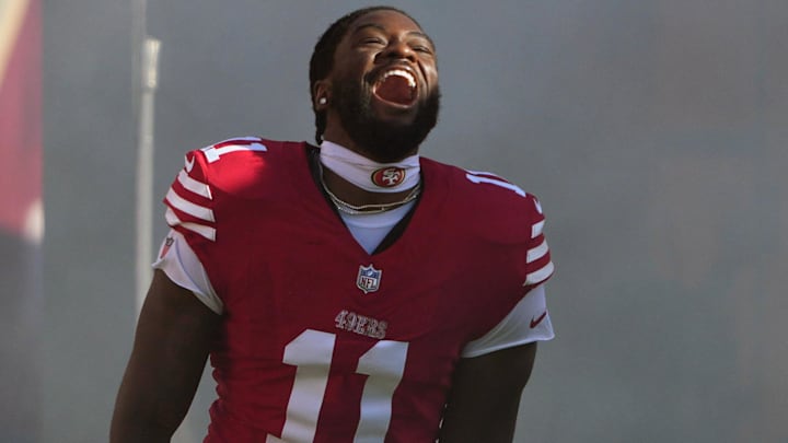 Sep 9, 2024; Santa Clara, California, USA; San Francisco 49ers wide receiver Brandon Aiyuk (11) is introduced to the crowd before the game against the New York Jets at Levi's Stadium. Mandatory Credit: Darren Yamashita-Imagn Images