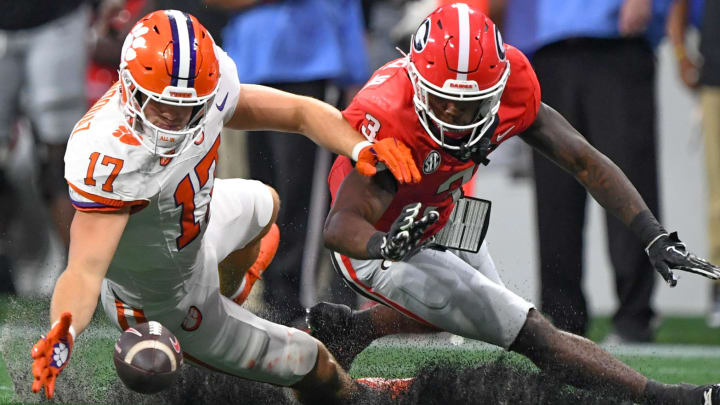 Aug 31, 2024; Atlanta, Georgia, USA; Clemson Tigers linebacker Wade Woodaz (17) reaches for an incomplete pass against Georgia Bulldogs running back Nate Frazier (3)  during the third quarter of the 2024 Aflac Kickoff Game at Mercedes-Benz Stadium