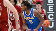 Mar 2, 2024; Pullman, Washington, USA; UCLA Bruins guard Brandon Williams (5) runs back pin defense against the Washington State Cougars in the second half at Friel Court at Beasley Coliseum. Washington State Cougars won 77-65. Mandatory Credit: James Snook-Imagn Images