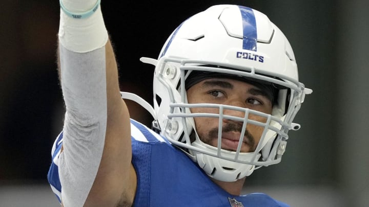 Sep 25, 2022; Indianapolis, Indiana, USA; Indianapolis Colts tight end Kylen Granson (83) points while warming up before a game against the Kansas City Chiefs at Lucas Oil Stadium in Indianapolis. Mandatory Credit: Robert Scheer/IndyStar Staff-USA TODAY Sports