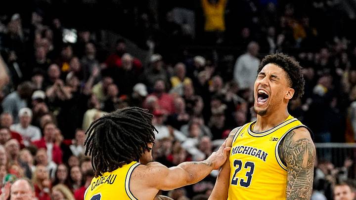 Michigan forward Yaxel Lendeborg (23) celebrates a 3-pointer against Wisconsin with guard Elliot Cadeau (3) during the second half of Big Ten Tournament semifinal at United Center in Chicago on Saturday, March 14, 2026.