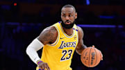 January 15, 2025; Los Angeles, California, USA; Los Angeles Lakers forward LeBron James (23) controls the ball against the Miami Heat during the second half at Crypto.com Arena. Mandatory Credit: Gary A. Vasquez-Imagn Images