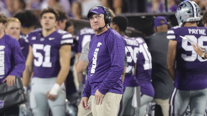 Kansas State Wildcats head coach Chris Klieman looks at the scoreboard during the second quarter of the game against Arizona at Bill Snyder Family Stadium on Friday, September 13, 2024.