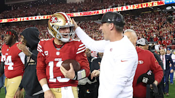 San Francisco 49ers quarterback Brock Purdy (L) and head coach Kyle Shanahan (R)