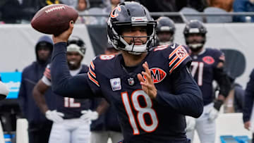 Oct 19, 2025; Chicago, Illinois, USA; Chicago Bears quarterback Caleb Williams (18) throws a pass against the New Orleans Saints during the first half at Soldier Field.