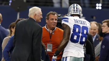 Jan 4, 2015; Arlington, TX, USA; New Jersey governor Chris Christie (center) greets Dallas Cowboys wide receiver Dez Bryant (88) and owner Jerry Jones prior to the game against the Detroit Lions in the NFC Wild Card Playoff Game at AT&T Stadium. Mandatory Credit: Matthew Emmons-USA TODAY Sports
