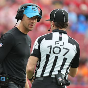 Dec 29, 2024; Tampa, Florida, USA; Carolina Panthers] head coach Dave Canales talks with referee Dave Hawkshaw against the Tampa Bay Buccaneers during the second half at Raymond James Stadium. |