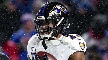 Jan 19, 2025; Orchard Park, New York, USA; Baltimore Ravens running back Derrick Henry (22) warms up before a 2025 AFC divisional round game against the Buffalo Bills at Highmark Stadium. Mandatory Credit: Mark Konezny-Imagn Images