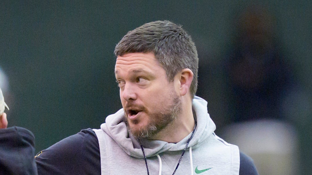 Oregon head coach Dan Lanning walks the field as the Oregon Ducks practice on Jan. 5, 2025, at the Moshofsky Center in Eugene, Oregon, ahead of the Peach Bowl.