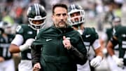 Michigan State's defensive coordinator Joe Rossi runs to the locker room before the game against Penn State on Saturday, Nov. 15, 2025, at Spartan Stadium in East Lansing.