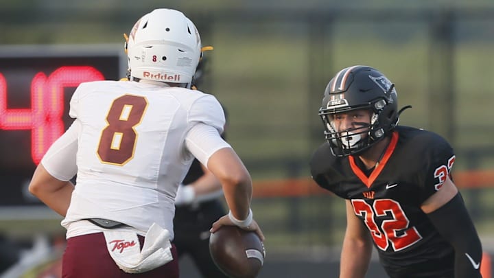 Ryle junior goes after Cooper senior as Cooper defeated Ryle 20-13 in KHSAA high school football Sept. 5, 2025 at Ryle High School, Union, Ky.