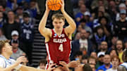 Mar 29, 2025; Newark, NJ, USA; Alabama Crimson Tide forward Grant Nelson (4) passes the ball against Duke Blue Devils forward Mason Gillis (18) during the second half in the East Regional final of the 2025 NCAA tournament at Prudential Center. Mandatory Credit: Robert Deutsch-Imagn Images