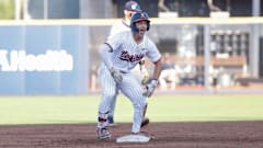 Anthony Stephan celebrates during the Virginia baseball game against Navy at Disharoon Park.