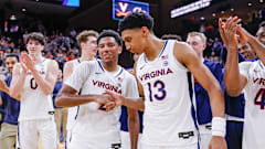 Reece Beekman and Ryan Dunn after Virginia's victory over Georgia Tech at John Paul Jones Arena.