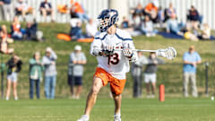 Ryan Colsey looks to pass the ball during the Virginia men's lacrosse game against Robert Morris at Klockner Stadium.