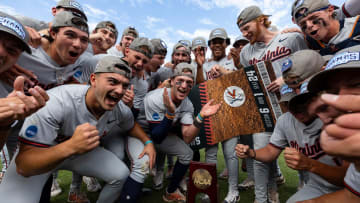 The Virginia baseball team celebrates after defeating Kansas State to advance to the 2024 College World Series.