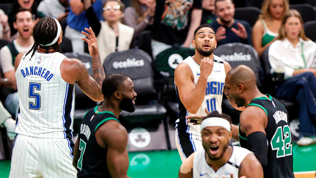 Boston Celtics center Al Horford and guard Jaylen Brown react after a fifth foul was called on Orlando Magic forward Paolo Banchero on Brown's drive to the basket in the third quarter of Game 5 of the NBA Eastern Conference playoffs against the Orlando Magic at TD Garden. Boston Celtics center Al Horford and guard Jaylen Brown react after a fifth foul was called on Orlando Magic forward Paolo Banchero on Brown's drive to the basket in the third quarter of Game 5 of the NBA Eastern Conference playoffs against the Orlando Magic at TD Garden.
