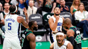 Boston Celtics center Al Horford and guard Jaylen Brown react after a fifth foul was called on Orlando Magic forward Paolo Banchero on Brown's drive to the basket in the third quarter of Game 5 of the NBA Eastern Conference playoffs against the Orlando Magic at TD Garden.