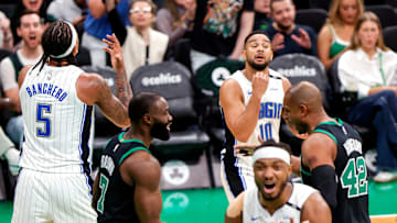 Boston Celtics center Al Horford and guard Jaylen Brown react after a fifth foul was called on Orlando Magic forward Paolo Banchero on Brown's drive to the basket in the third quarter of Game 5 of the NBA Eastern Conference playoffs against the Orlando Magic at TD Garden.