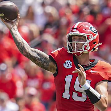 Sep 7, 2024; Athens, Georgia, USA; Georgia Bulldogs quarterback Carson Beck (15) passes the ball against the Tennessee Tech Golden Eagles during the first half at Sanford Stadium. Mandatory Credit: Dale Zanine-Imagn Images