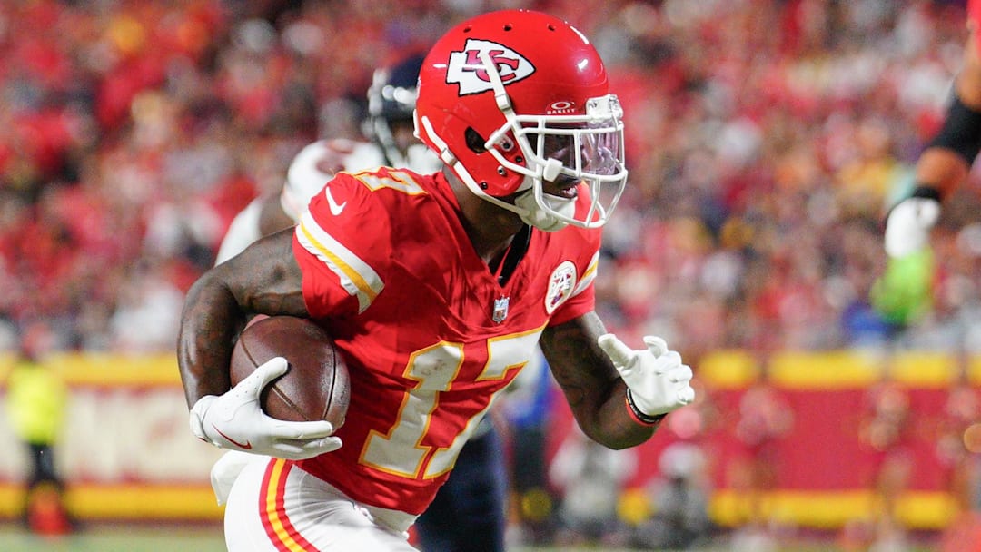 Former Kansas City Chiefs wide receiver Mecole Hardman (17) runs the ball against the Chicago Bears during the game at GEHA Field at Arrowhead Stadium.