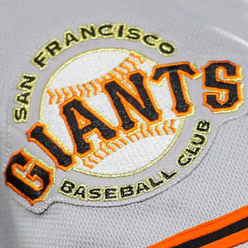Jul 18, 2023; Cincinnati, Ohio, USA; The San Francisco Giants logo on the sleeve of a baseball player. 