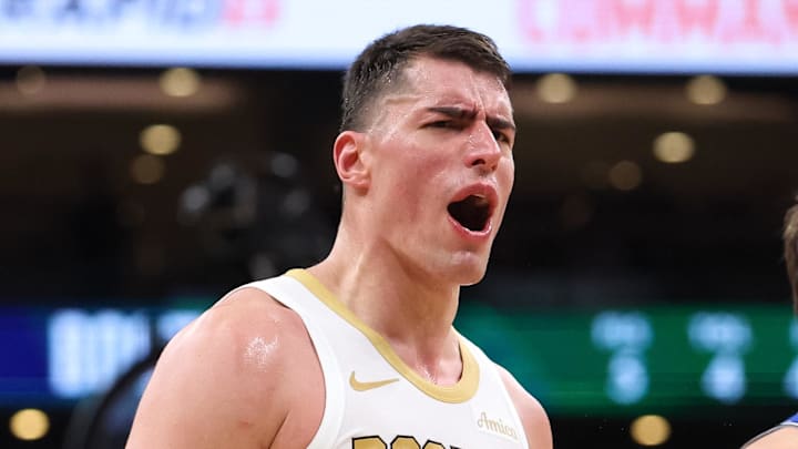 Apr 12, 2026; Boston, Massachusetts, USA; Boston Celtics forward Luka Garza (52) reacts during the second half against the Orlando Magic at TD Garden. Mandatory Credit: Paul Rutherford-Imagn Images
