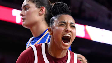 Feb 13, 2025; Los Angeles, California, USA; USC Trojans guard JuJu Watkins (12) lets out a yell after scoring in the fourth quarter against the UCLA Bruins at Galen Center. Mandatory Credit: Robert Hanashiro-Imagn Images