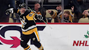 Nov 23, 2024; Pittsburgh, Pennsylvania, USA;  Pittsburgh Penguins center Sidney Crosby (87) reacts after scoring his 600th career NHL goal against the Utah Hockey Club during the second period at PPG Paints Arena. Mandatory Credit: Charles LeClaire-Imagn Images