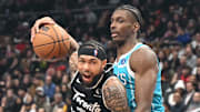 Toronto Raptors forward Brandon Ingram tries to get past Charlotte Hornets forward Moussa Diabate.