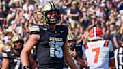 Purdue Boilermakers quarterback Ryan Browne (15) runs to celebrate a touchdown 