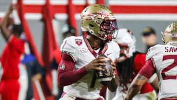 Nov 21, 2025; Raleigh, North Carolina, USA; Florida State Seminoles quarterback Tommy Castellanos (1) with the ball during the first half of the game against NC State Wolfpack at Carter-Finley Stadium. Mandatory Credit: Jaylynn Nash-Imagn Images