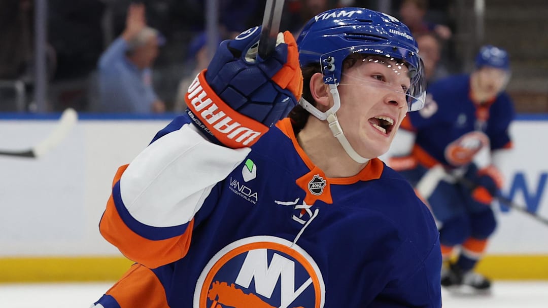 Jan 3, 2026; Elmont, New York, USA; New York Islanders defenseman Matthew Schaefer (48) celebrates after scoring the winning goal in overtime against the Toronto Maple Leafs at UBS Arena. Mandatory Credit: Thomas Salus-Imagn Images