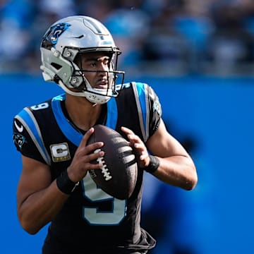Nov 9, 2025; Charlotte, North Carolina, USA;  Carolina Panthers quarterback Bryce Young (9) looks to pass during the third quarter against the New Orleans Saints at Bank of America Stadium. Mandatory Credit: Jim Dedmon-Imagn Images