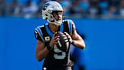 Nov 9, 2025; Charlotte, North Carolina, USA;  Carolina Panthers quarterback Bryce Young (9) looks to pass during the third quarter against the New Orleans Saints at Bank of America Stadium. Mandatory Credit: Jim Dedmon-Imagn Images