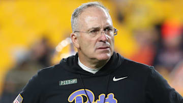 Nov 9, 2024; Pittsburgh, Pennsylvania, USA;  Pittsburgh Panthers head coach Pat Narduzzi observes warm ups before the game against the Virginia Cavaliers at Acrisure Stadium. Mandatory Credit: Charles LeClaire-Imagn Images