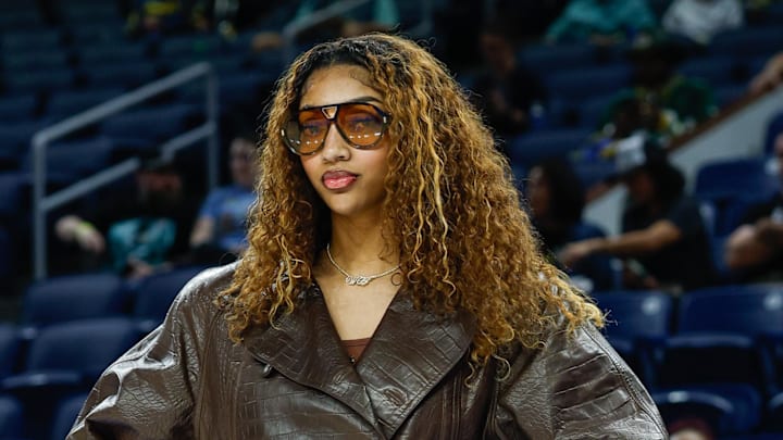 Sep 11, 2025; Chicago, Illinois, USA; Injured Chicago Sky forward Angel Reese (5) stands on the sidelines before a WNBA game against the New York Liberty at Wintrust Arena. Mandatory Credit: Kamil Krzaczynski-Imagn Images
