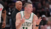 Mar 24, 2025; Sacramento, California, USA; Boston Celtics guard Payton Pritchard (11) reacts after making a three point basket against the Sacramento Kings in the fourth quarter at the Golden 1 Center.