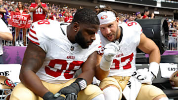 San Francisco 49ers defensive tackle Javon Hargrave (L) and defensive end Nick Bosa (R)